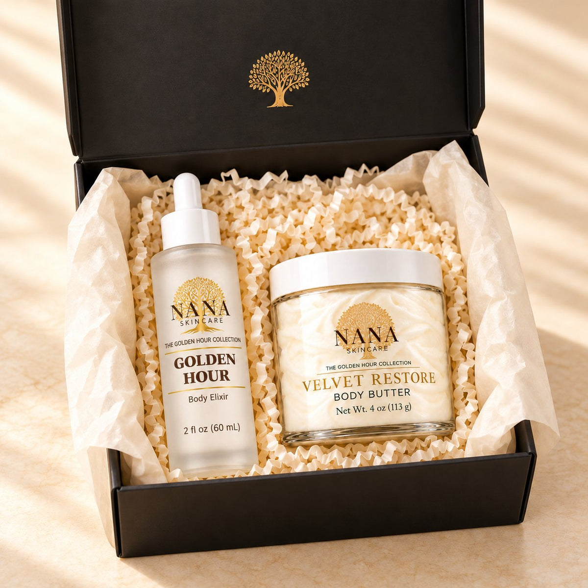 Golden Hour Body Ritual: Golden Hour Body Elixir 2 fl oz and Velvet Restore Body Butter 4 oz in a black Nana gift box